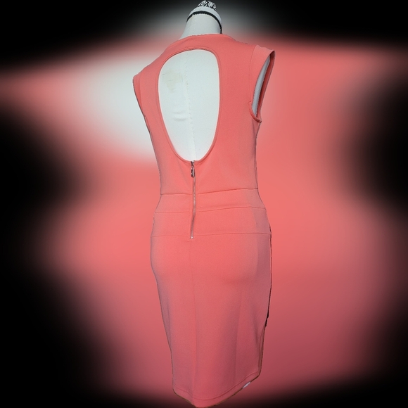 Guess Dresses & Skirts - Never worn, Guess orange/corral,  sexy open back dress. Size M
